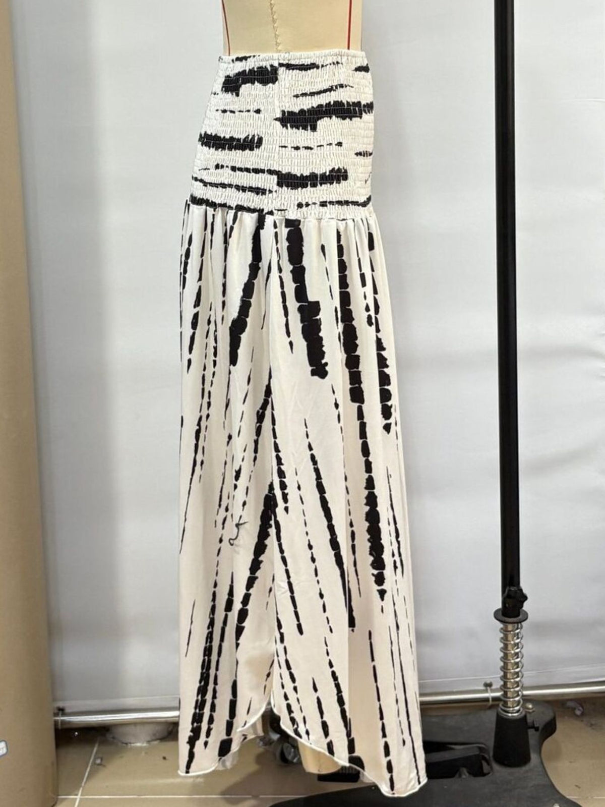 Smocked Asymmetrical Hem Maxi Skirt - Gloss & Grit