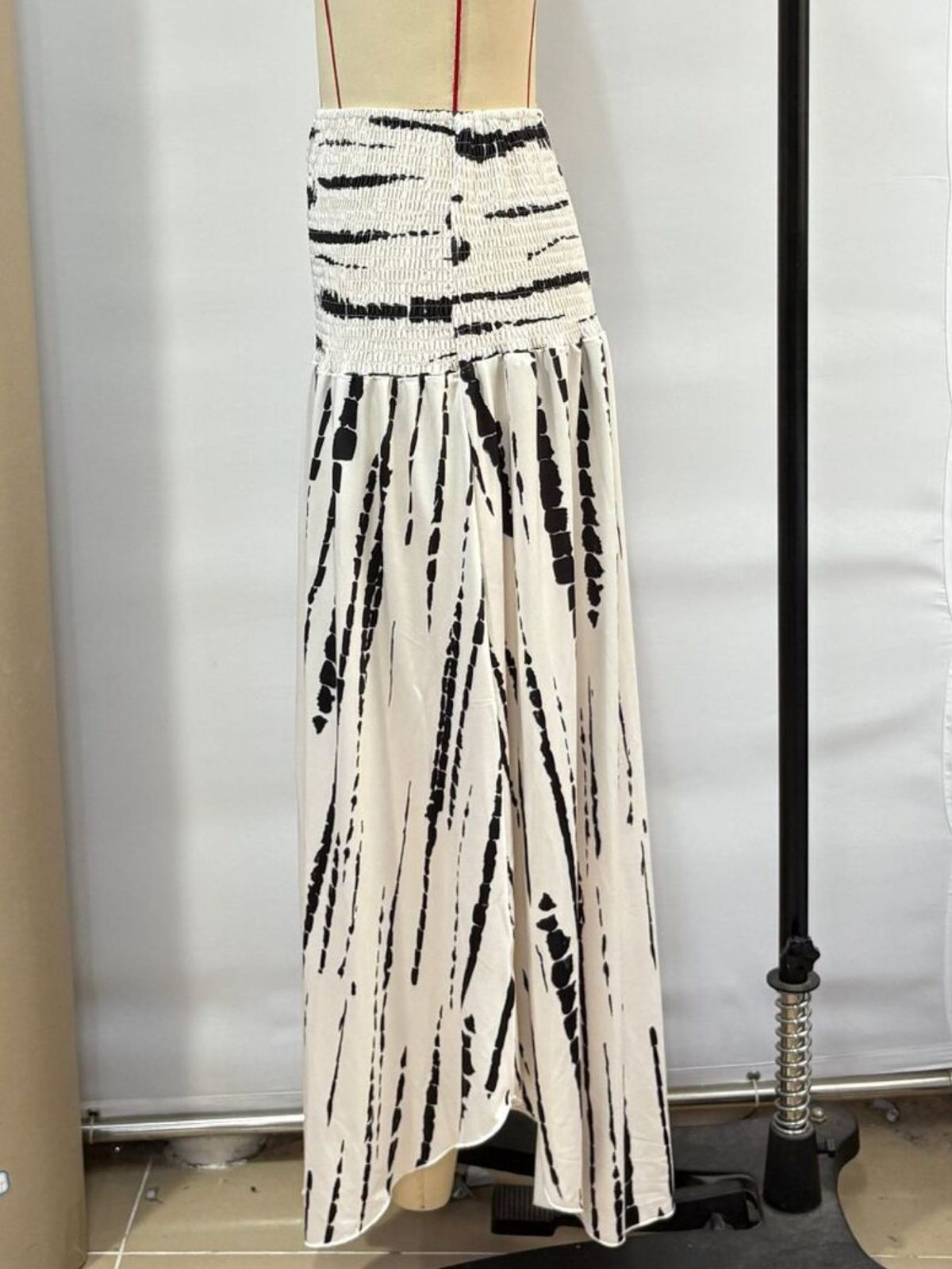 Smocked Asymmetrical Hem Maxi Skirt - Gloss & Grit