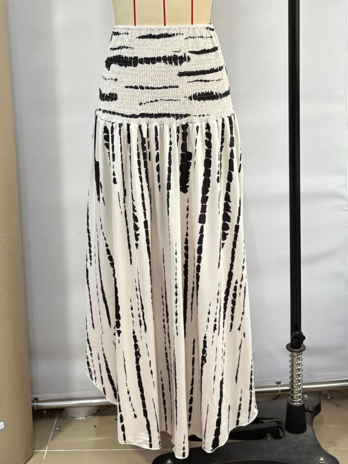 Smocked Asymmetrical Hem Maxi Skirt - Gloss & Grit