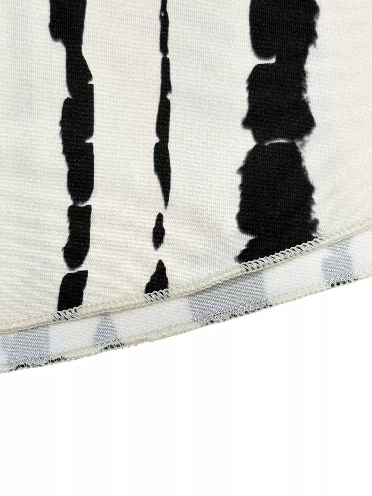 Smocked Asymmetrical Hem Maxi Skirt - Gloss & Grit