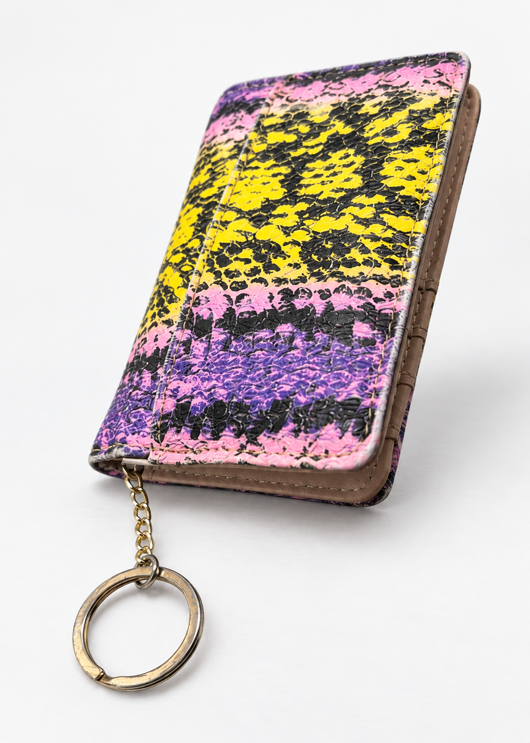 Juicy Couture snakeskin wallet angled back view with key ring