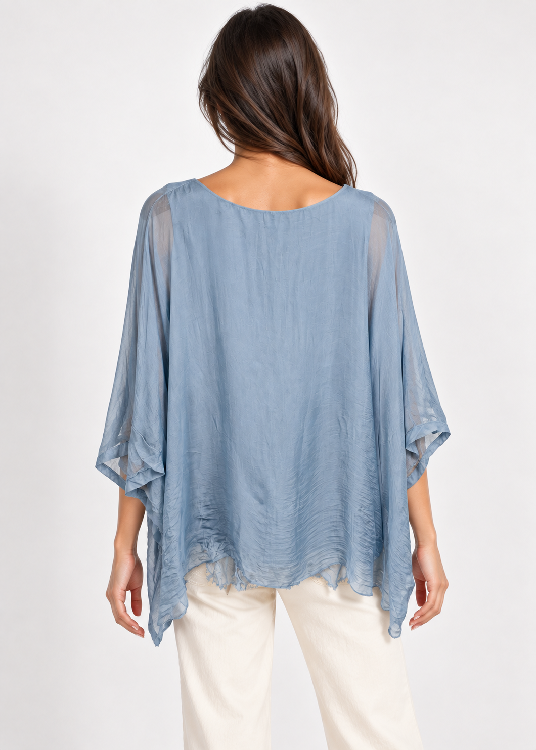 Mercantile light blue silk layered blouse on model, back view