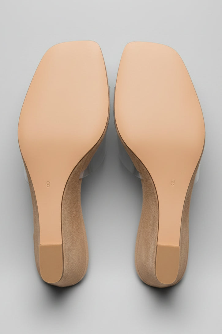 Soles of Oakmoo wedge mule sandals showing women’s size 9