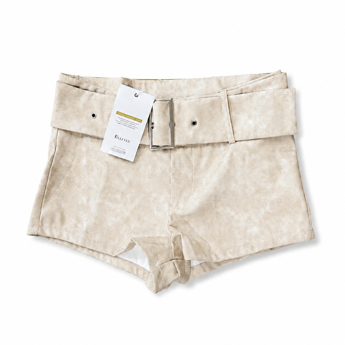 ELLEVEN beige belted faux leather shorts front view