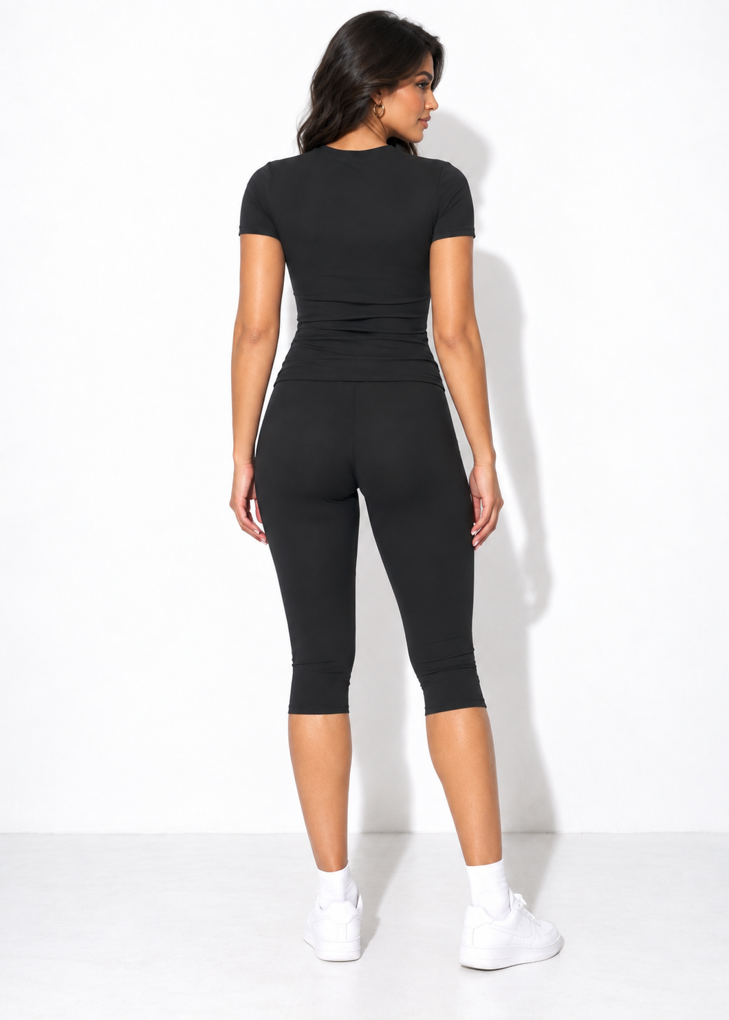 Tatum Capri Set in black, back view on model