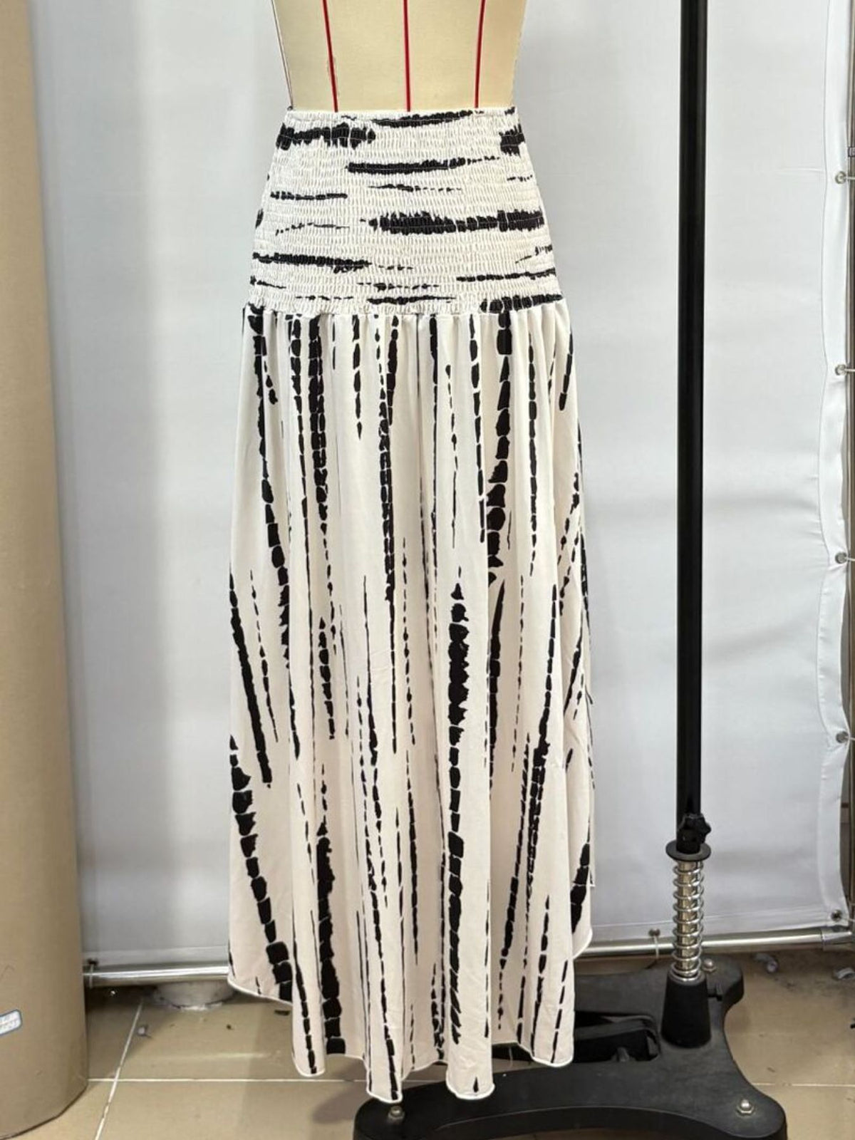 Smocked Asymmetrical Hem Maxi Skirt - Gloss & Grit