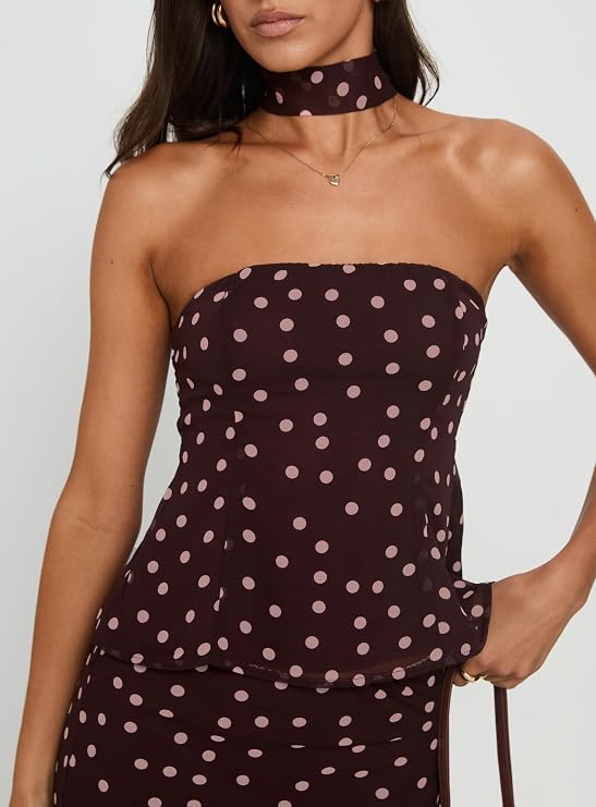 Close-up of the Princess Polly chocolate and pink polka dot strapless top with scarf