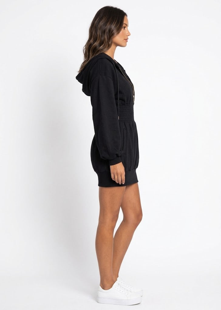Side view of the black Brielle hooded mini dress with kangaroo pocket