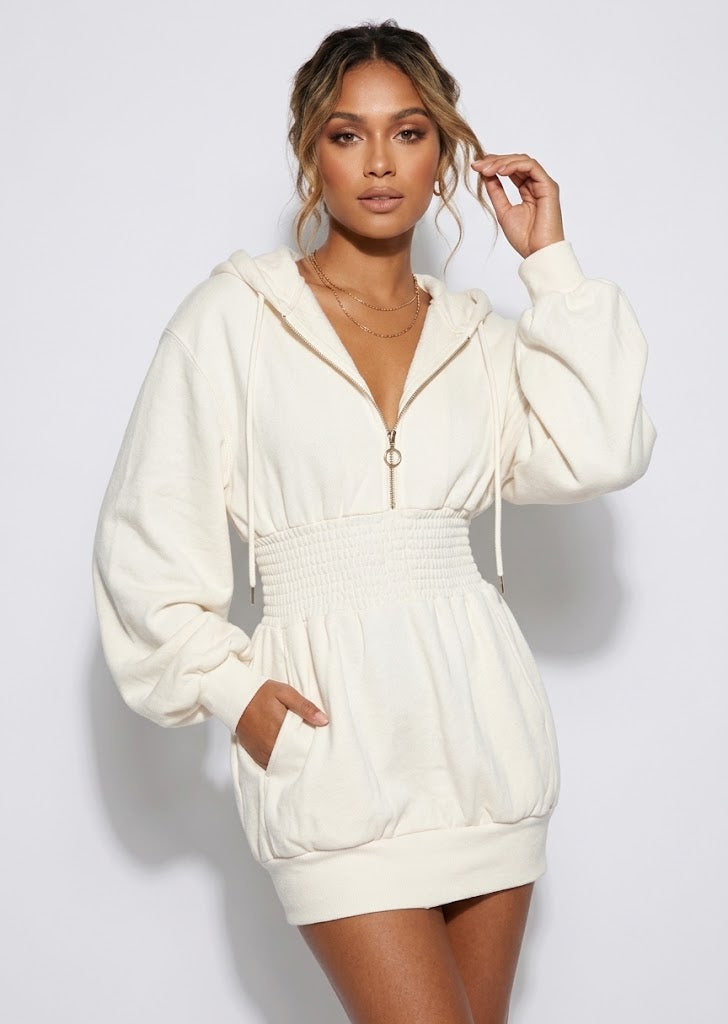 Brielle hooded mini dress in white with zip front and smocked waist, front view