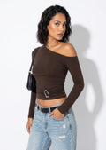 Calista brown one-shoulder buckle top with long sleeves, styled with light jeans