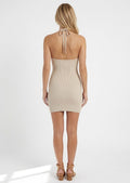 Back view of the Cotton On cream knit halter mini dress with open back tie