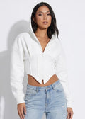 Cropped zip corset hoodie in white with a pointed corset hem, front view