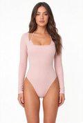 Cielle lace halter bodysuit in pink with long sleeves and square neck, front view