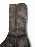 Close-up of Matisse tall leather boot zipper and distressed shaft