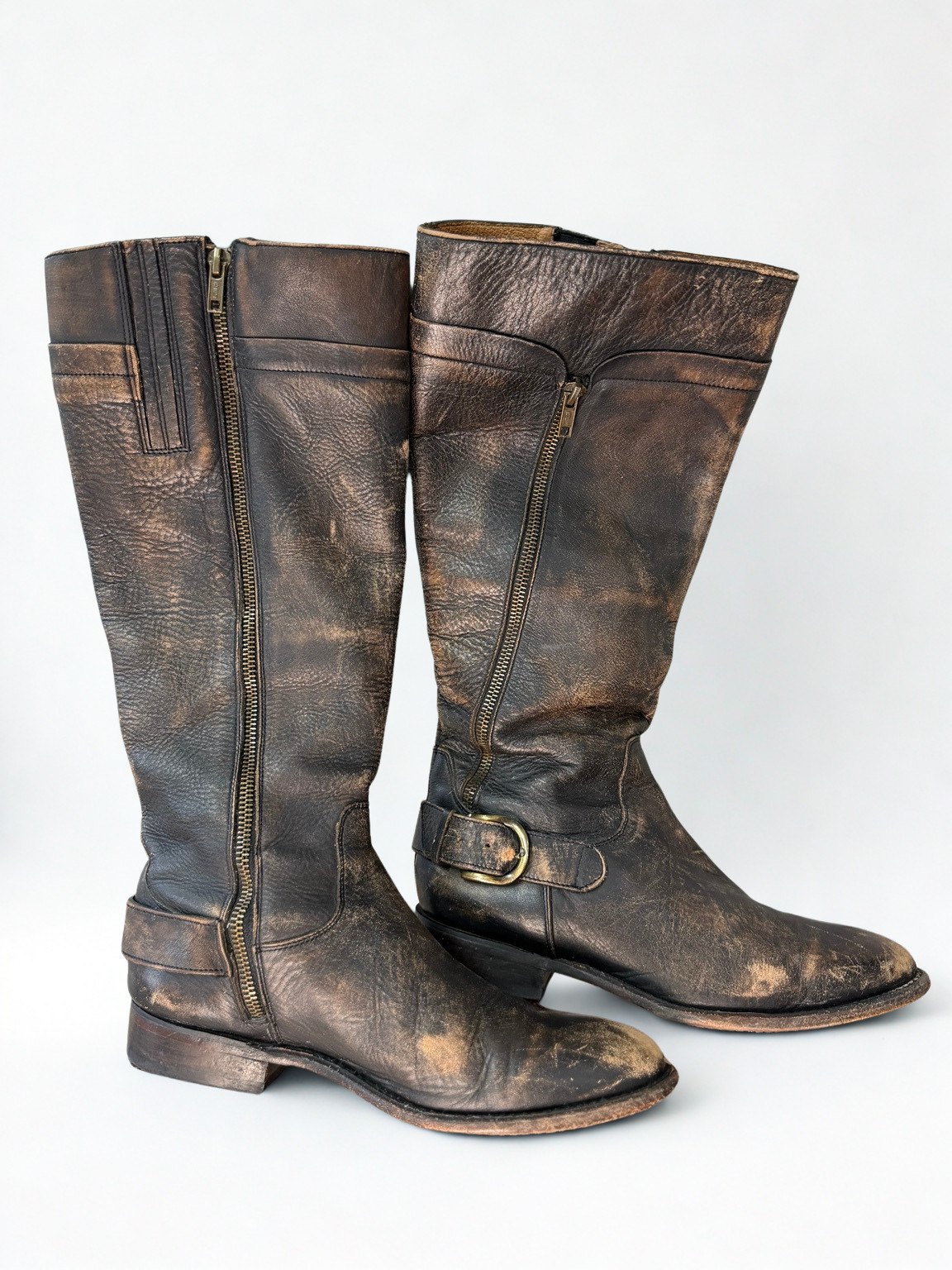Pair of Matisse tall distressed brown leather harness boots