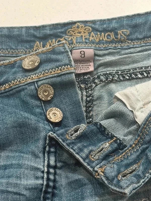 Almost Famous distressed denim micro mini skirt, inside waistband label and button fly