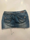 Almost Famous distressed denim micro mini skirt, back view with raw hem