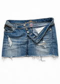 Almost Famous denim micro mini skirt showing open button fly, distressed denim and raw hem