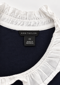 Ann Taylor size XS label and white ruffled neckline detail