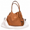 Coach Edie 31 Tea Rose leather bag with dust bag on studio white background
