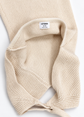 Interior knit and Cotton On size M label of cream halter mini dress