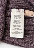 Fabric composition and size L label for Daisy Fuentes purple metallic dress
