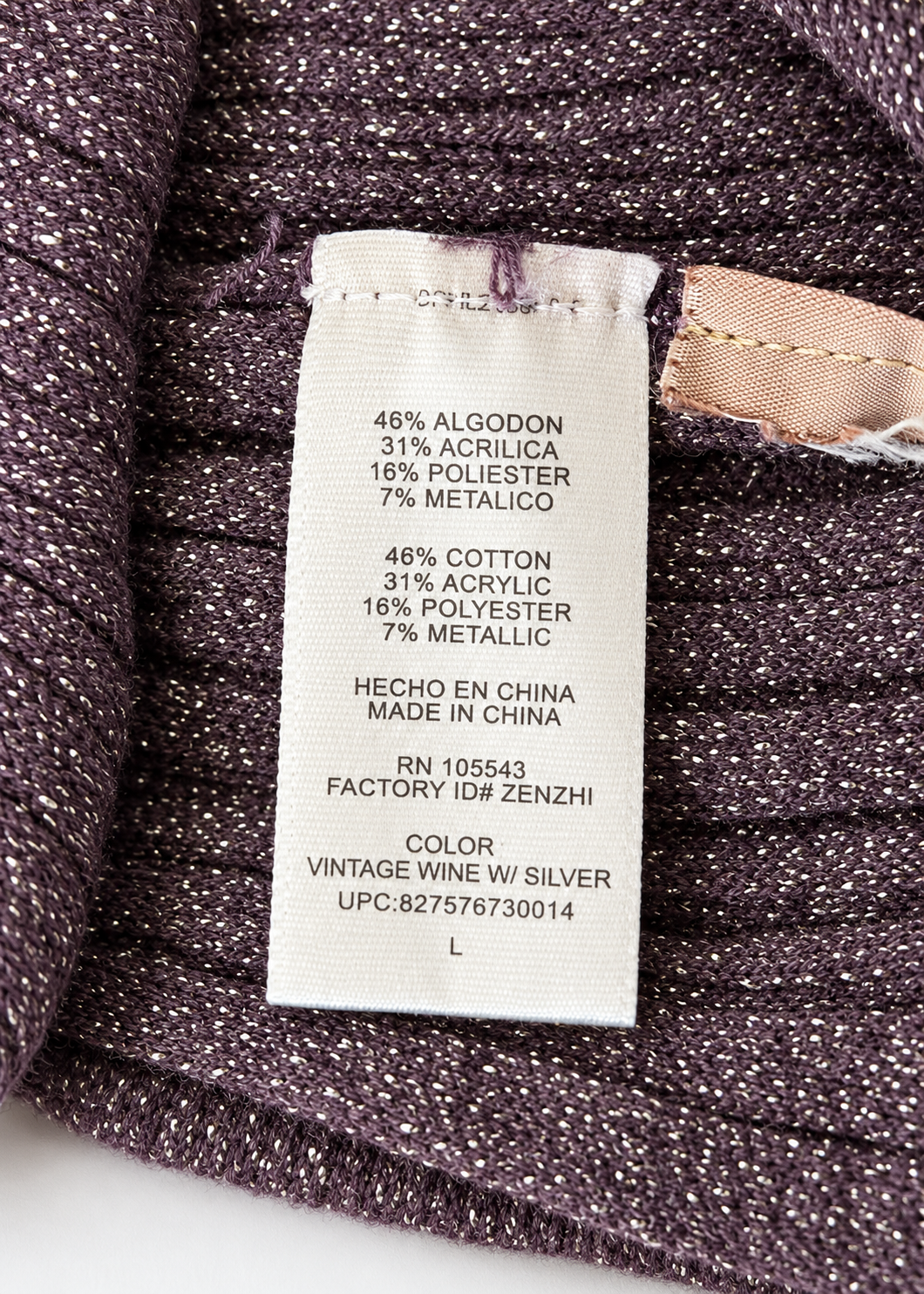 Fabric composition and size L label for Daisy Fuentes purple metallic dress
