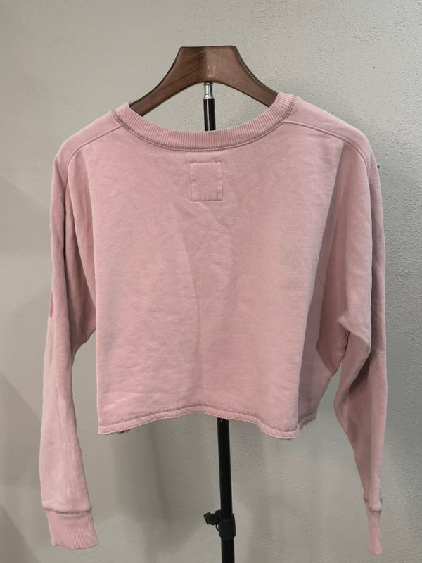 Gilly Hicks pink cropped graphic sweatshirt, back view on hanger
