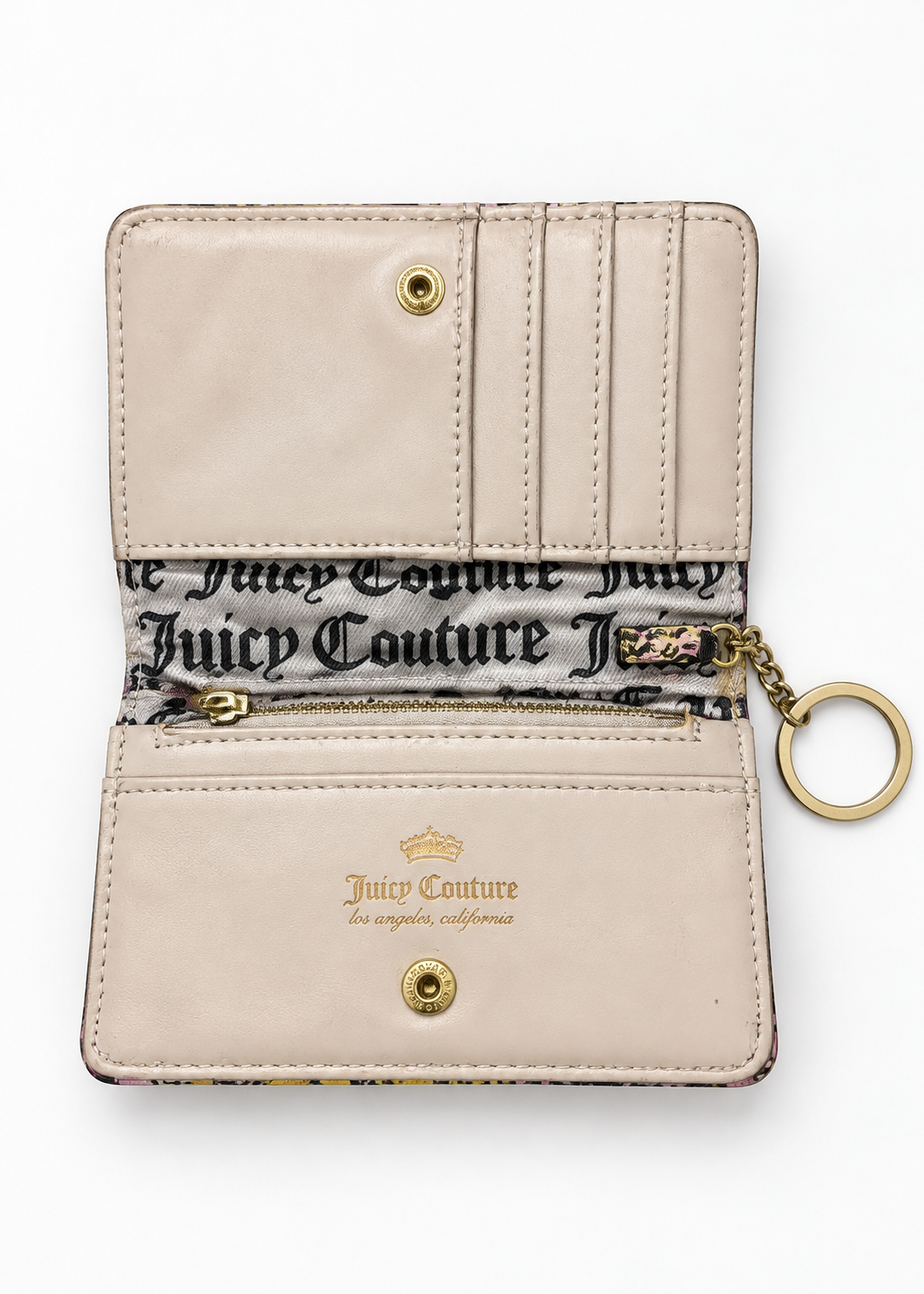 Juicy Couture bifold wallet open flat-lay showing interior and key ring