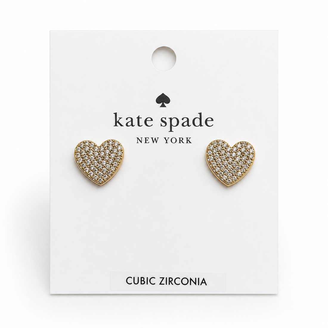 Kate Spade Yours Truly clear pave heart stud earrings on retail card, front view