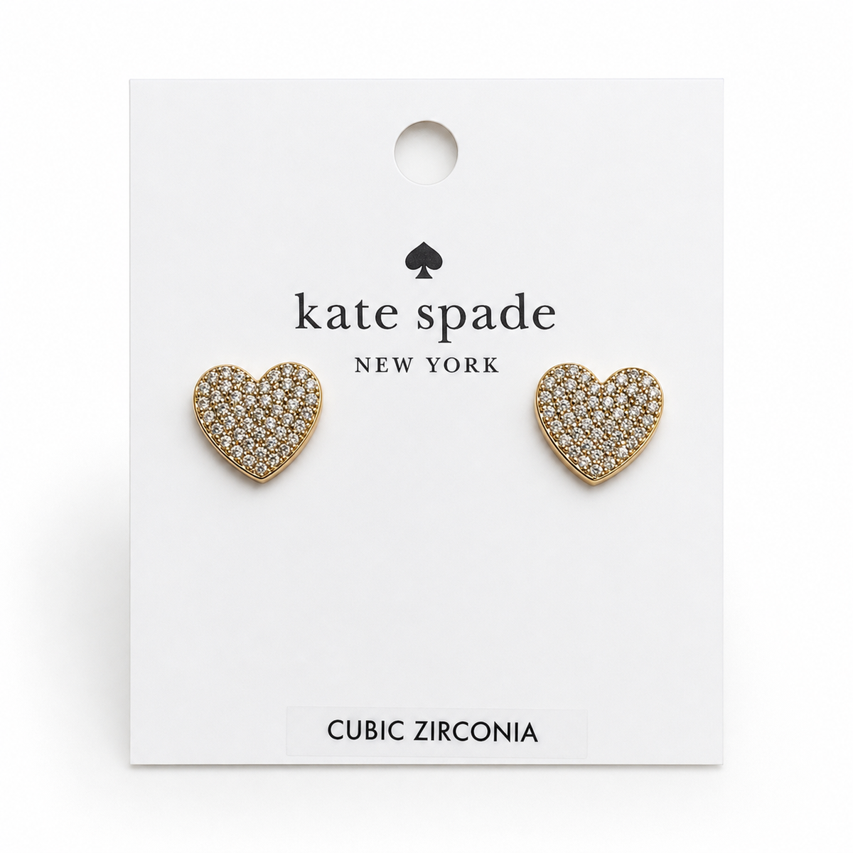 Kate Spade Yours Truly clear pave heart stud earrings on retail card, front view