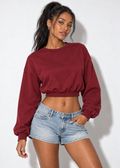 Keely cropped sweatshirt in red, front view styled with light blue denim shorts