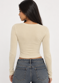 Landon pearl-button long-sleeve top in khaki, back model view