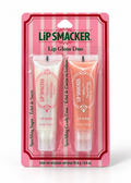 Lip Smacker Holiday Lip Gloss Duo front packaging with Sparkling Sugar and Sparkling Candy Cane glosses on a white studio background