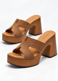 Brown Maribel platform mules with MSYIEVAD branding on the footbeds
