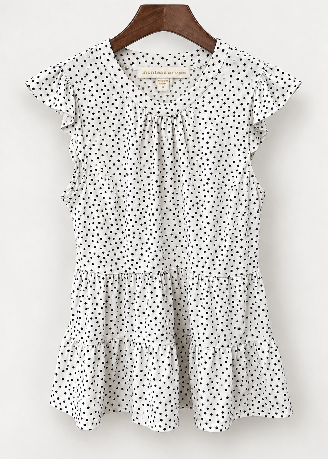 Monteau Los Angeles polka dot peplum top with corrected brand and size S label, front