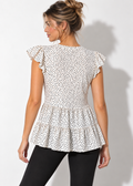 Monteau polka dot peplum top, back view