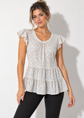 Monteau polka dot peplum top with black leggings, front view