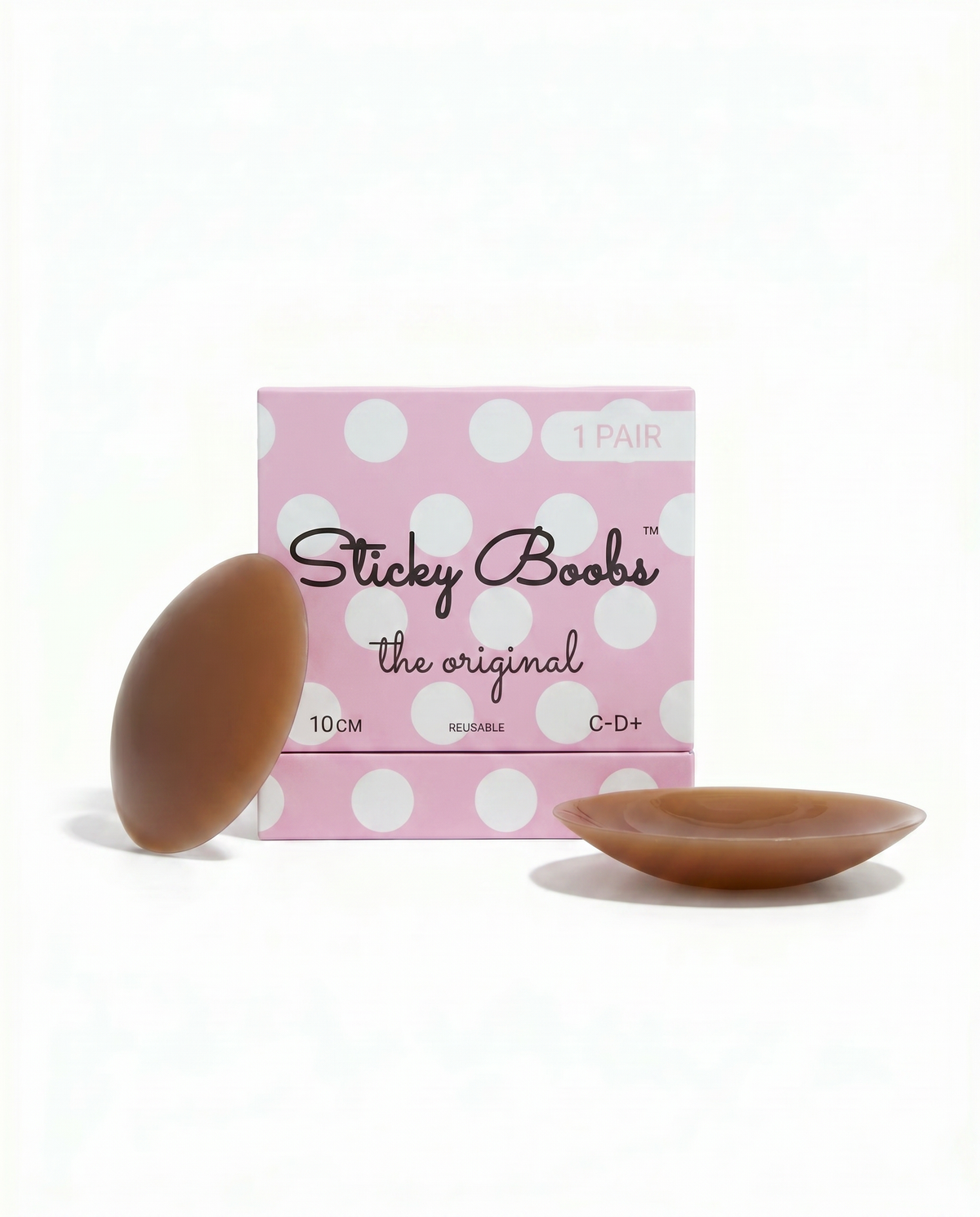 Sticky Boobs reusable nipple covers in dark, cup size C-D, beside the box