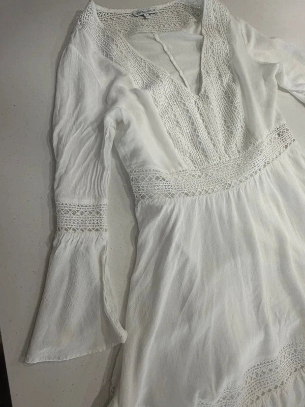 Rebecca Minkoff white crochet mini dress, front bodice and bell sleeve