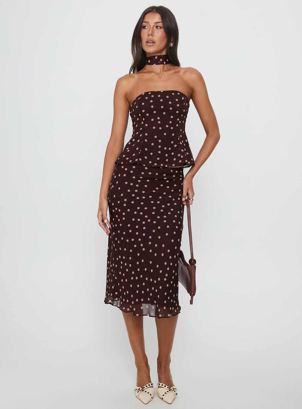 Princess Polly Sydni midi skirt in chocolate brown and pink polka dots, side view