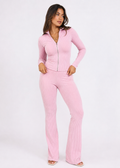 Model wearing Ulovmi pink ribbed zip-up top and flare pants set, front view