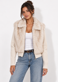 Vesper Faux Fur Cropped Jacket in off-white, front view styled with jeans