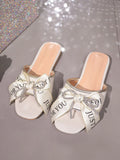 Bow Slide Flat Sandals with Oversized Bow - Gloss & Grit