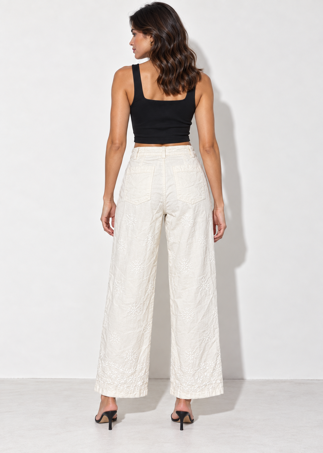 Back model view of cream Zara ZW Collection embroidered wide-leg pants